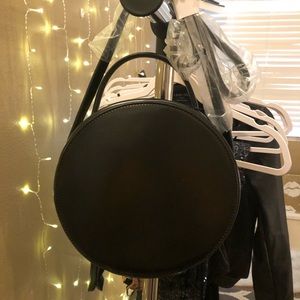 Brand new circle handbag with gold zipper